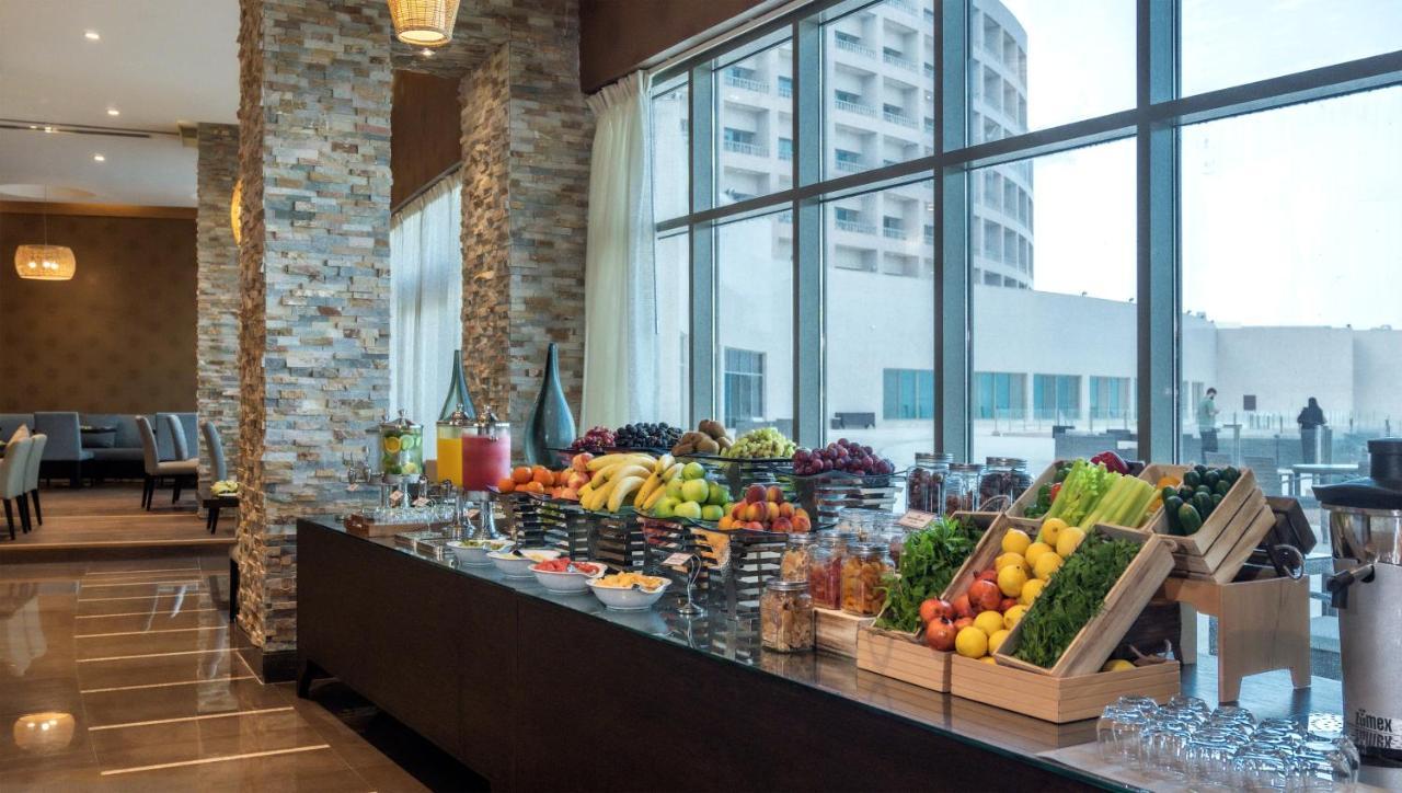 Hotel Grand Millennium Gizan à Jizan Extérieur photo A buffet at a hotel